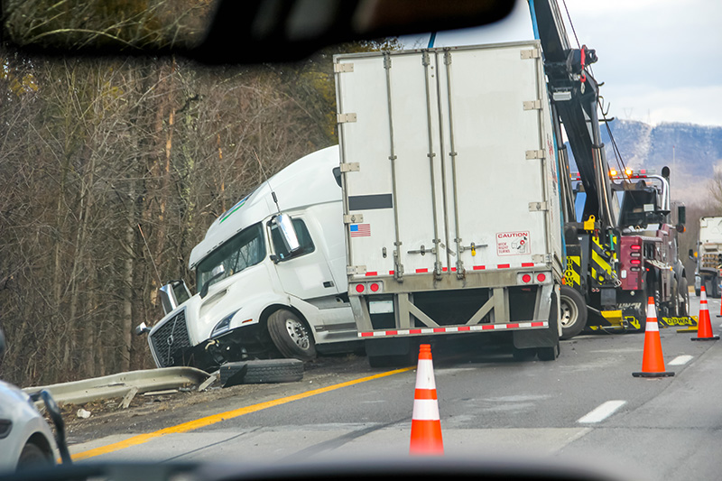 truck accident scene with a bus driver